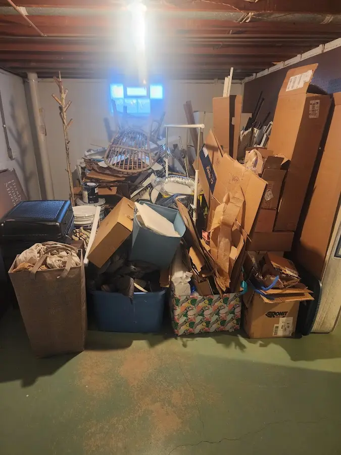 Roll-off dumpster container at job site for 6 Yard Dumpster Rental in Waupun